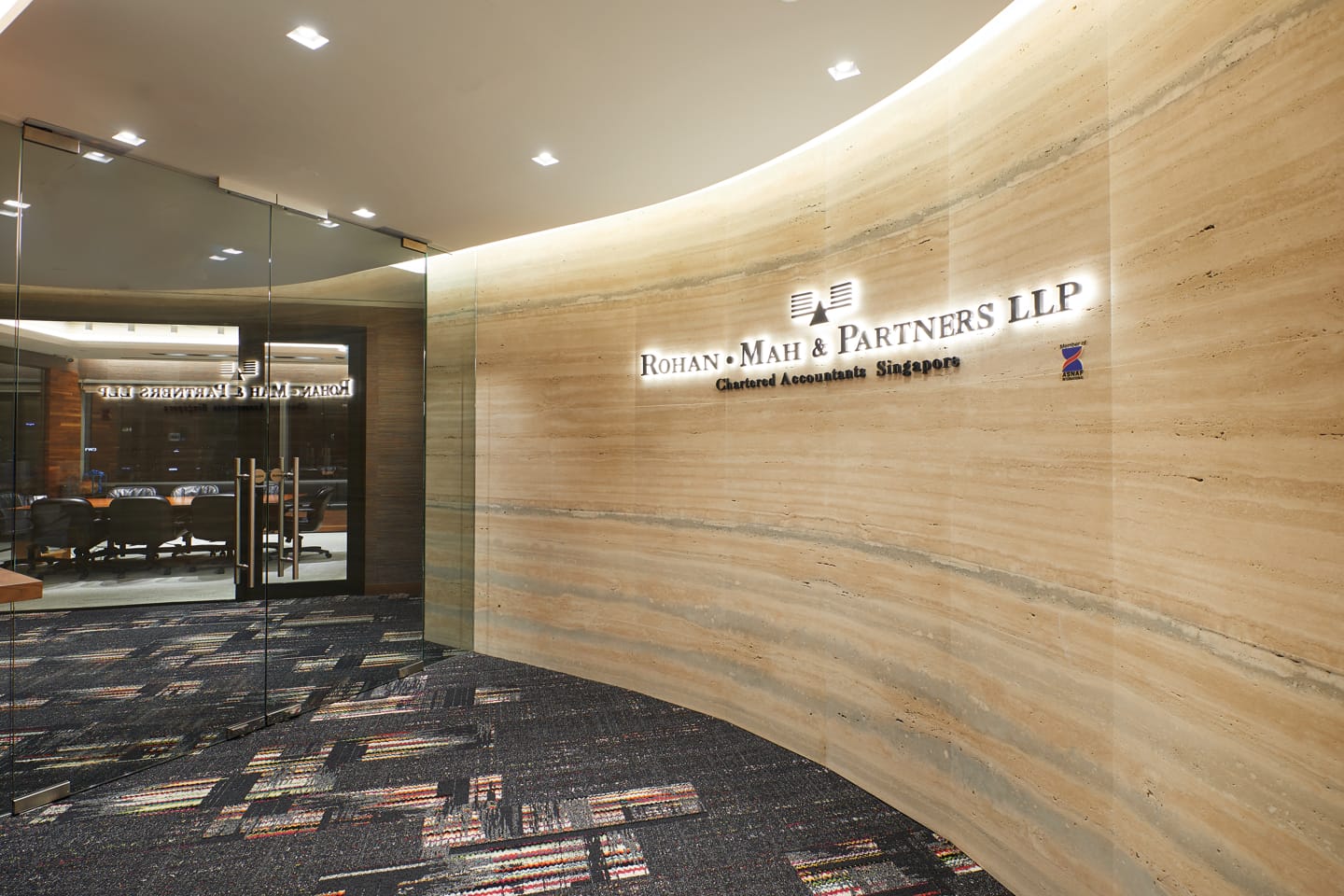 Rohan · Mah & Partners LLP senior conference room overlooking Singapore Marina Bay financial district